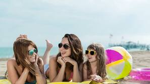 Private beach, free beach shuttle, sun loungers, beach umbrellas