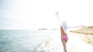 Private beach, free beach shuttle, sun loungers, beach umbrellas