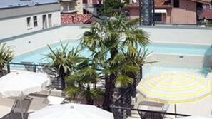 Outdoor pool, pool umbrellas, pool loungers