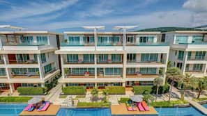 Outdoor pool, open 6:30 AM to 8:00 PM, pool umbrellas, pool loungers