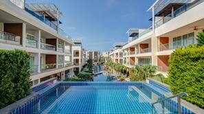Outdoor pool, open 6:30 AM to 8:00 PM, pool umbrellas, pool loungers