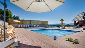 Indoor pool, outdoor pool, pool umbrellas, sun loungers
