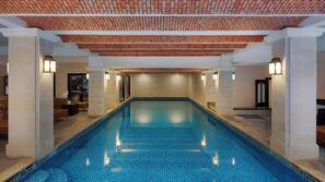 Indoor pool, pool umbrellas, sun loungers