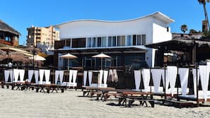 On the beach, beach towels, beach massages, beach bar