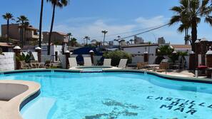 Outdoor pool, open 9:00 AM to 8:00 PM, pool umbrellas, sun loungers