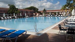 Outdoor pool, open 7:00 AM to 6:00 PM, pool umbrellas, sun loungers