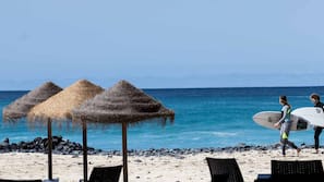 On the beach, white sand, free beach shuttle, beach bar