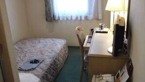 Desk, blackout curtains, free WiFi, linens