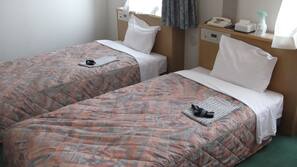 Desk, blackout curtains, free WiFi, linens