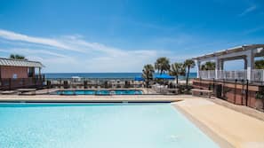 2 outdoor pools, pool umbrellas, sun loungers