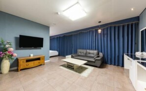 Deluxe Suite (Room Only) | Blackout drapes, iron/ironing board, free WiFi