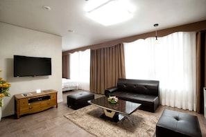 Deluxe Suite (Room Only) | Blackout drapes, iron/ironing board, free WiFi