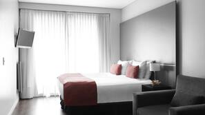 Premium bedding, down comforters, pillowtop beds, in-room safe