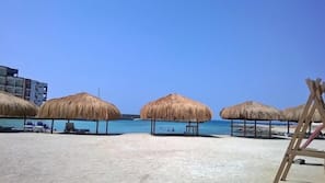 Private beach nearby, beach shuttle, sun loungers, beach umbrellas