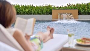 Outdoor pool, open 6:00 AM to 10:00 PM, pool umbrellas, pool loungers