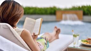 Outdoor pool, open 6:00 AM to 10:00 PM, pool umbrellas, pool loungers