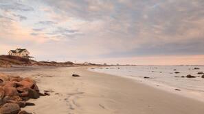 On the beach, sun loungers, beach towels