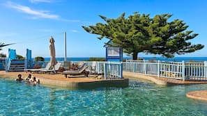 Outdoor pool, open 7:30 AM to 5:30 PM, pool umbrellas, sun loungers