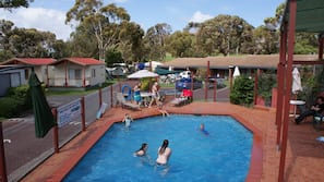 Seasonal outdoor pool, pool umbrellas