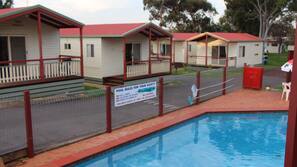 Seasonal outdoor pool, pool umbrellas