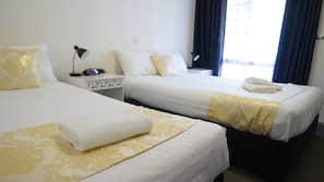 Pillowtop beds, desk, blackout drapes, iron/ironing board