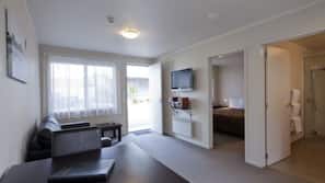 Premium bedding, blackout curtains, iron/ironing board, free WiFi