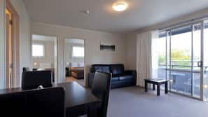 Premium bedding, blackout curtains, iron/ironing board, free WiFi