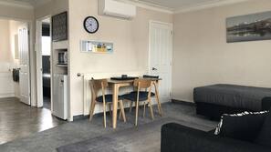 49-inch TV with satellite channels, DVD player