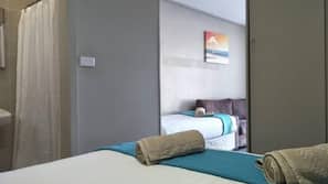 Desk, blackout curtains, iron/ironing board, rollaway beds