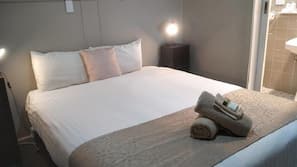 Desk, blackout curtains, iron/ironing board, rollaway beds