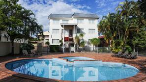 Outdoor pool, open 7:00 AM to 8:00 PM, pool loungers