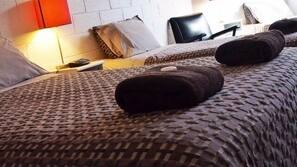 Blackout curtains, iron/ironing board, free cots/infant beds