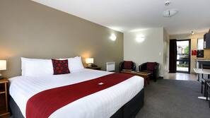 Premium bedding, blackout curtains, soundproofing, iron/ironing board
