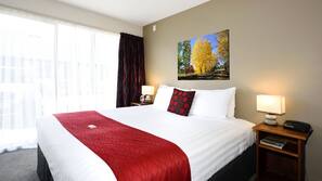 Premium bedding, blackout curtains, soundproofing, iron/ironing board