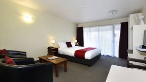 Premium bedding, blackout curtains, soundproofing, iron/ironing board