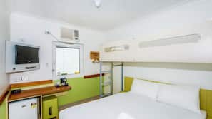 Premium bedding, laptop workspace, blackout curtains, cots/infant beds