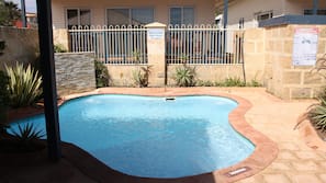2 outdoor pools, open 7:30 AM to 7:00 PM, pool umbrellas, pool loungers
