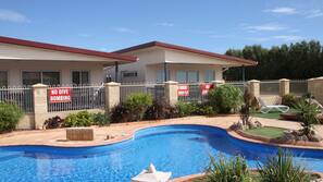 2 outdoor pools, open 7:30 AM to 7:00 PM, pool umbrellas, pool loungers