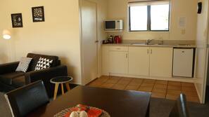 Fridge, microwave, hob, coffee/tea maker
