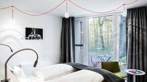 Luxe beddengoed, een gratis minibar, een kluis op de kamer, een bureau