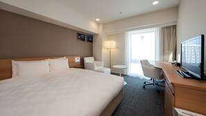 Down comforters, desk, free WiFi, linens