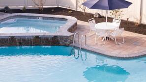 Outdoor pool, pool umbrellas, sun loungers
