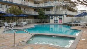 Outdoor pool, pool umbrellas, sun loungers
