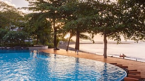 Outdoor pool, pool umbrellas, sun loungers