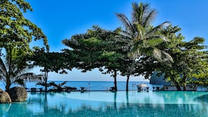 Outdoor pool, pool umbrellas, sun loungers