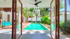 Outdoor pool, pool umbrellas, pool loungers