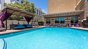 Outdoor pool, open 8:00 AM to 10:00 PM, free cabanas