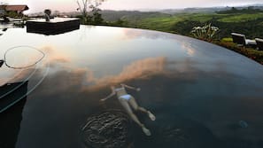 Indoor pool, outdoor pool, pool umbrellas, sun loungers