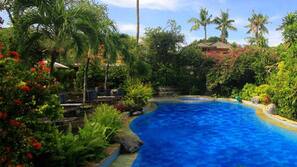 3 outdoor pools, open 9:00 AM to 10:00 PM, pool umbrellas, pool loungers