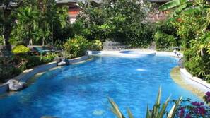3 outdoor pools, open 9:00 AM to 10:00 PM, pool umbrellas, pool loungers